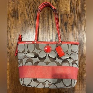 Orange and khaki Coach purse